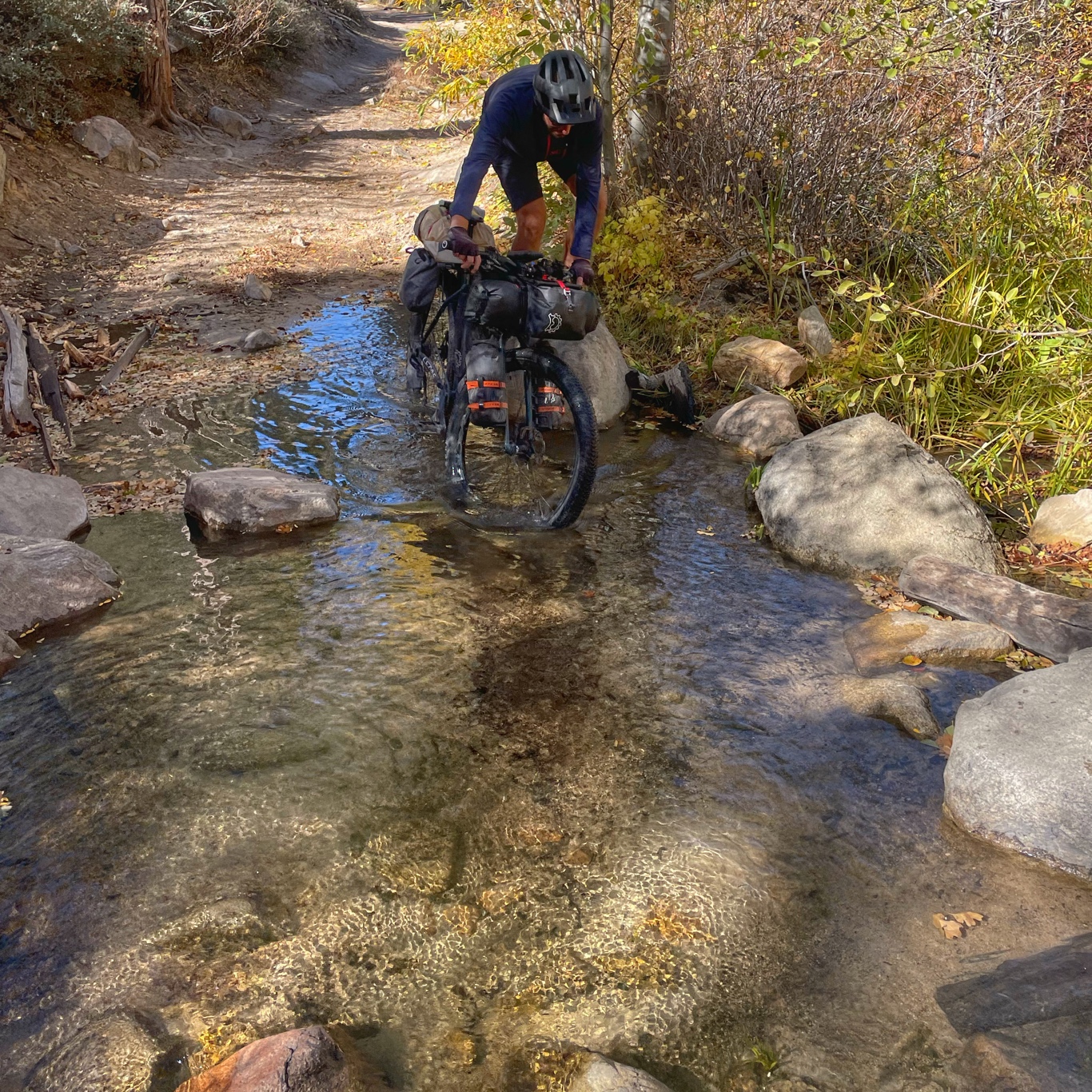 Getting our bike over the water